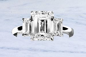 4.01 Carat GIA Three-Stone Emerald Cut Diamond - Platinum Engagement Ring  