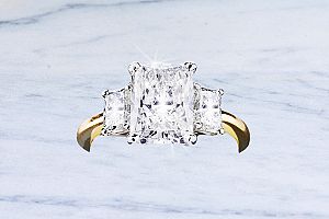 3.30 Carat GIA Elongated RADIANT Cut Diamond - PLATINUM/14K YG Three-Stone Engagement Ring 